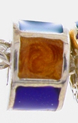 16974-Six Section Enameled Wheel Bead in Mardi Gras Colors