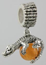 19204-Rondelle with Alligator Holding Carnelian Bead